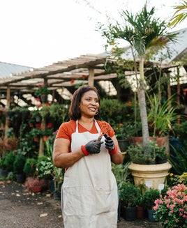 Business owner outside nursery