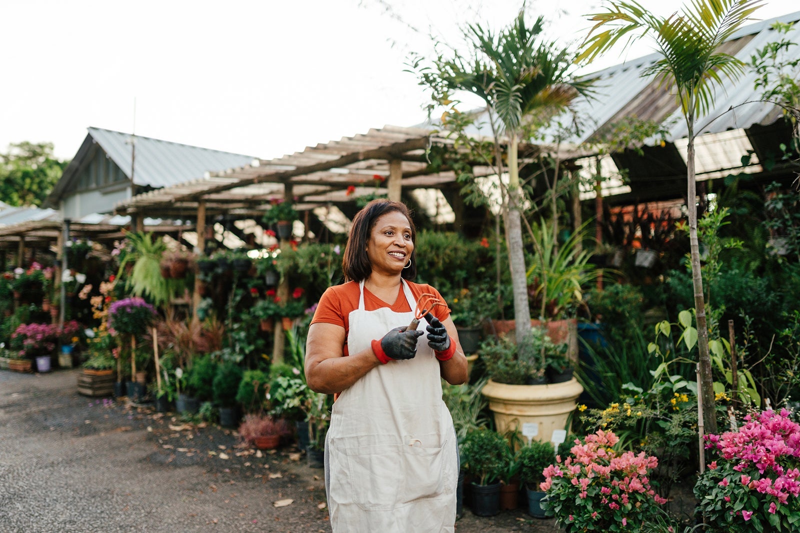 Business owner outside nursery