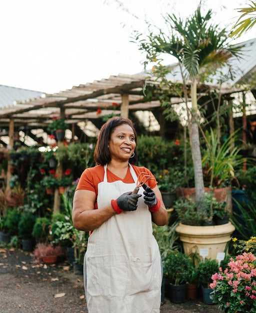 Business owner outside nursery