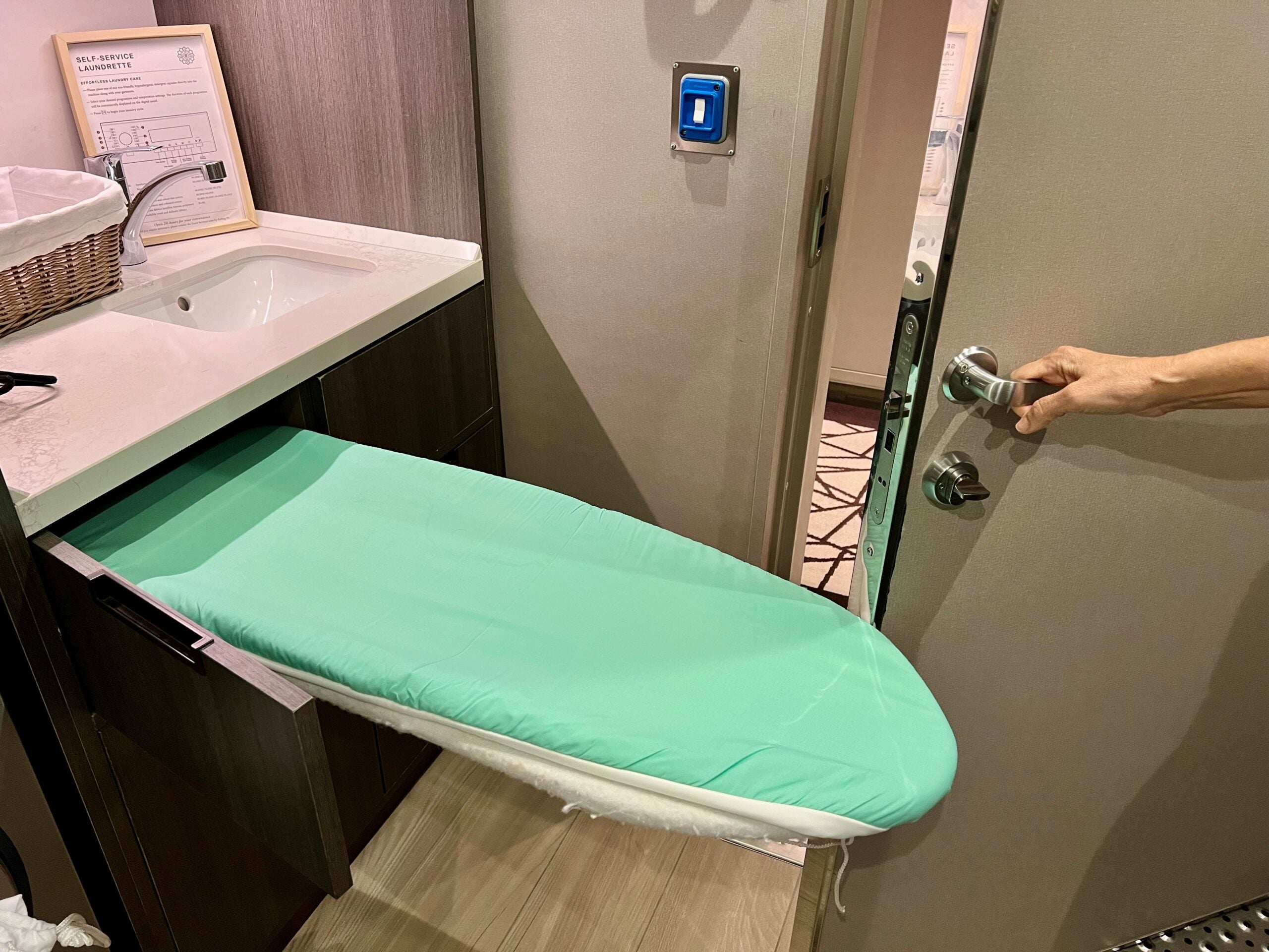 An ironing board in a launderette on Explora I