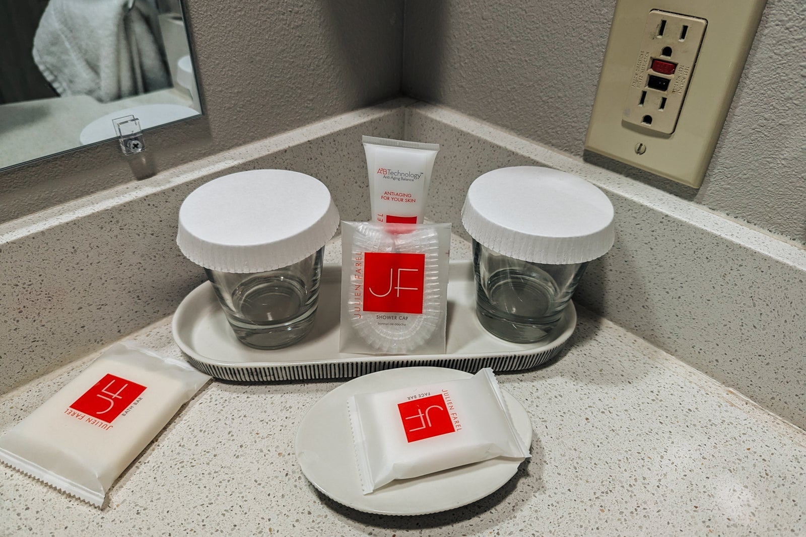 Glasses and soap in hotel bathroom