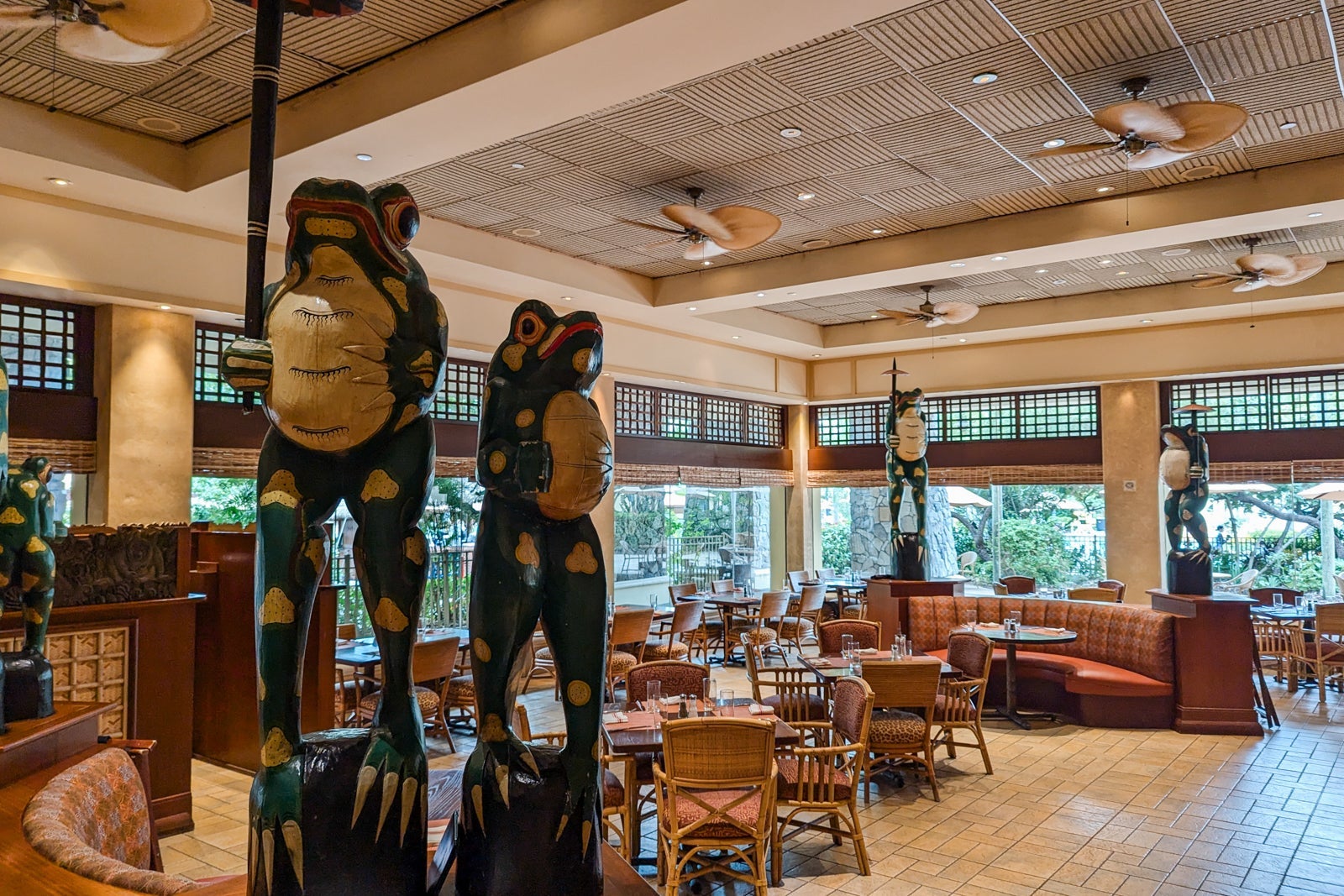 dining room with frog statues