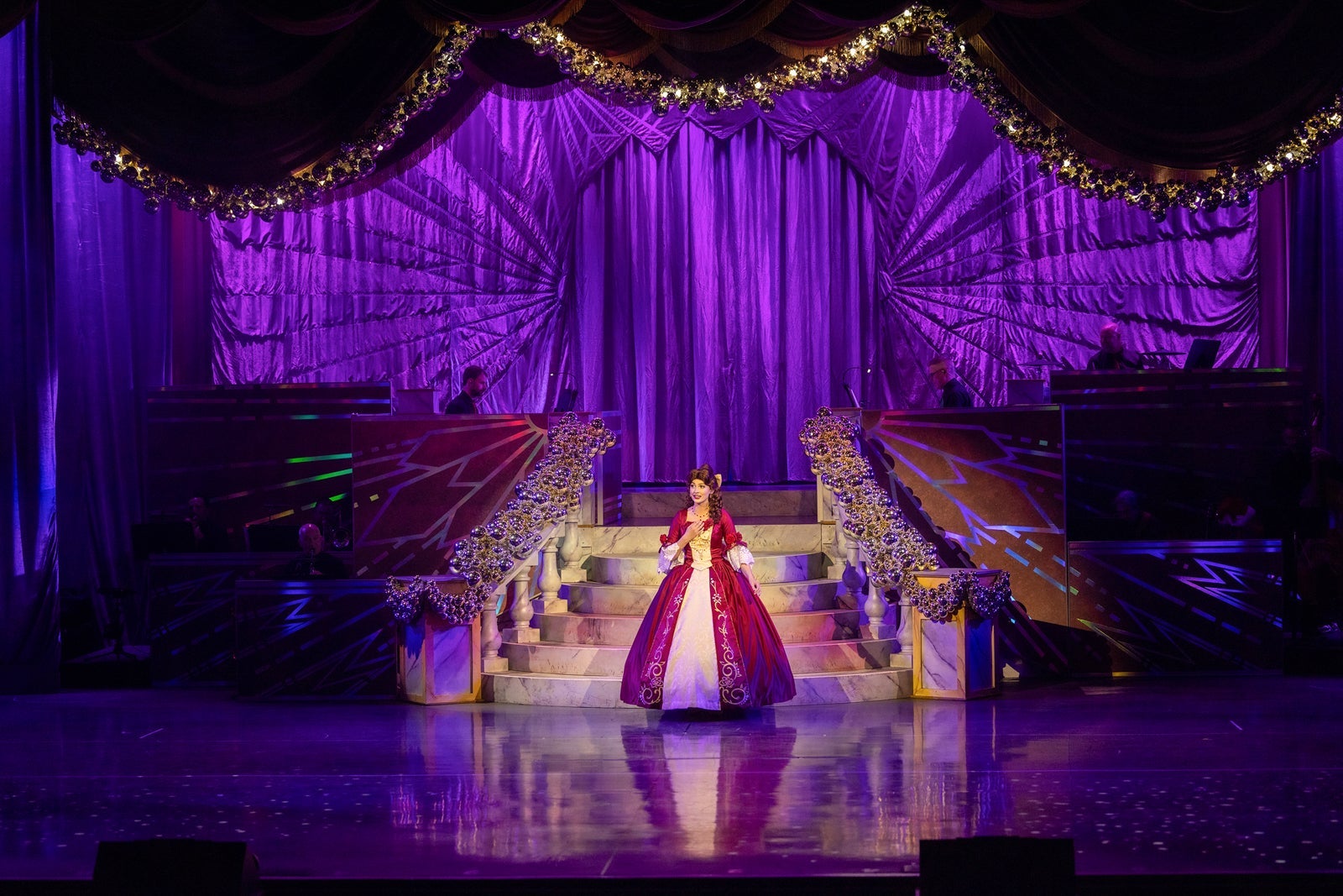 Belle in her Christmas outfit as she performs at Disney's Jollywood Nights 2024