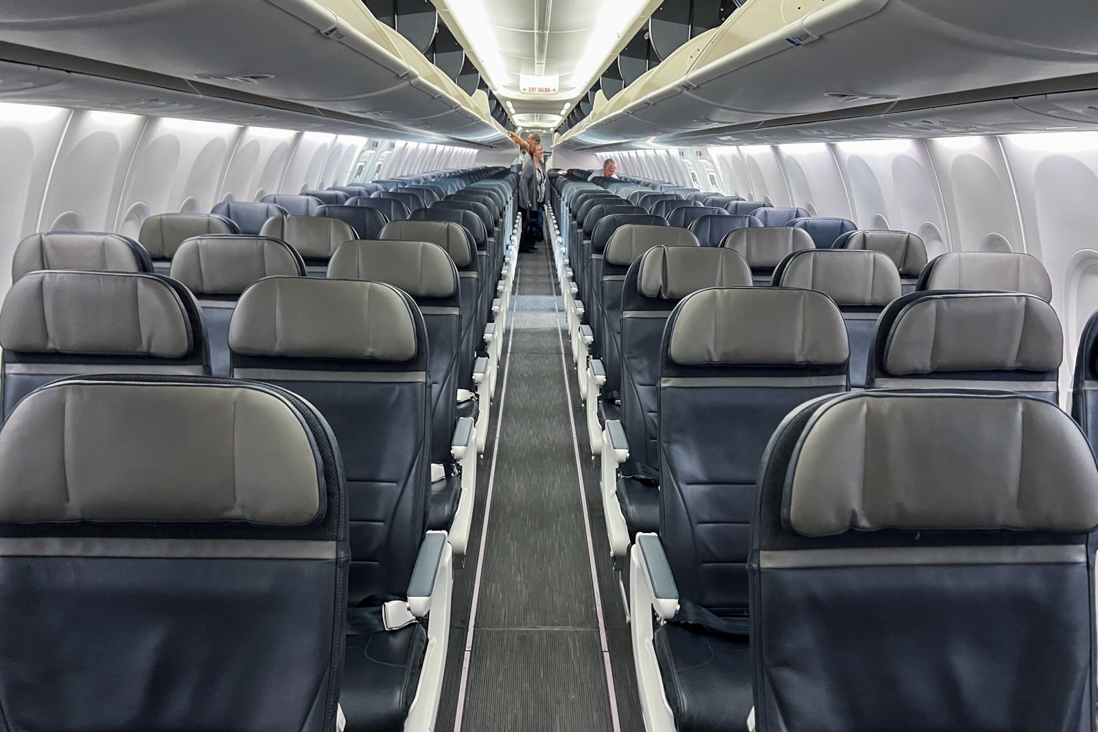rows of blue and gray airplane seats