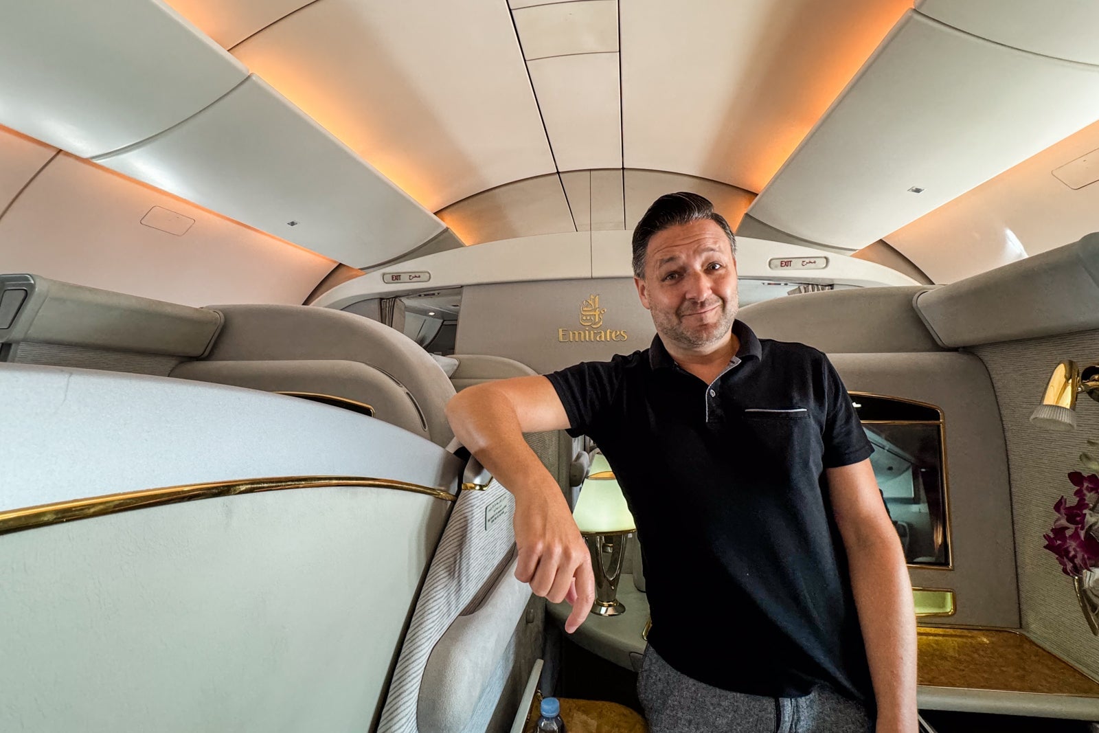 Eric Rosen in a first-class seat on Emirates