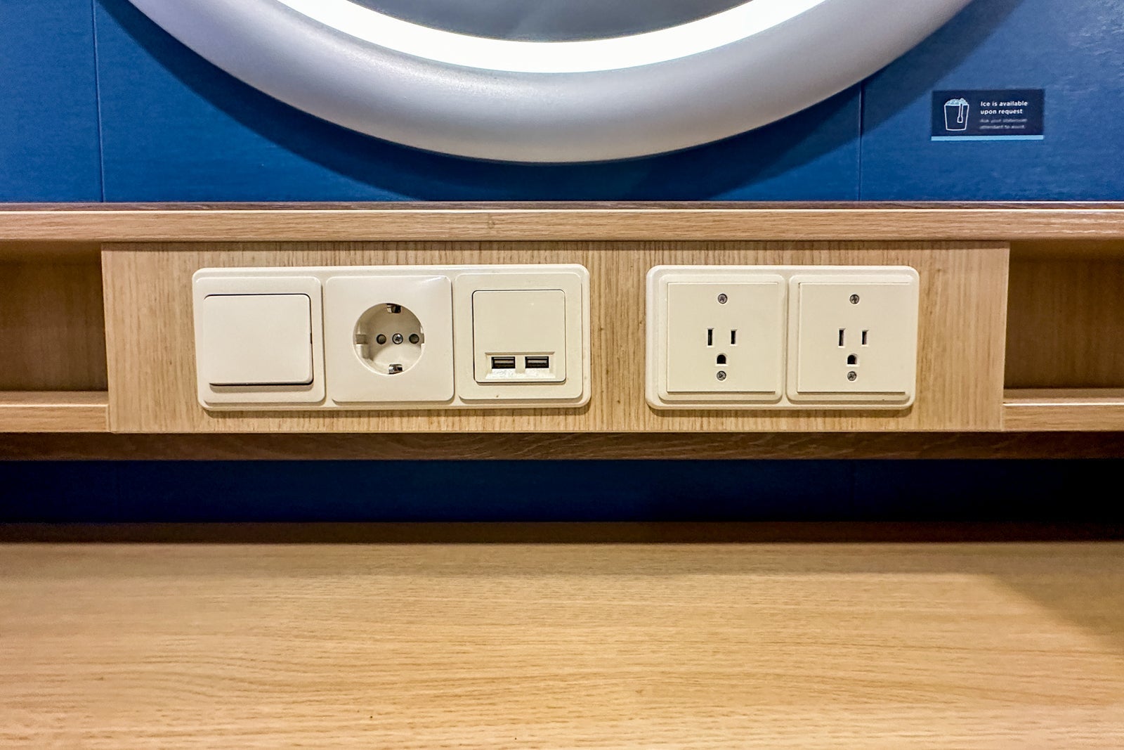 A selection of charging outlets in a cruise ship cabin