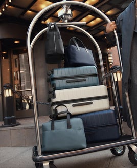 suitcases on luggage cart