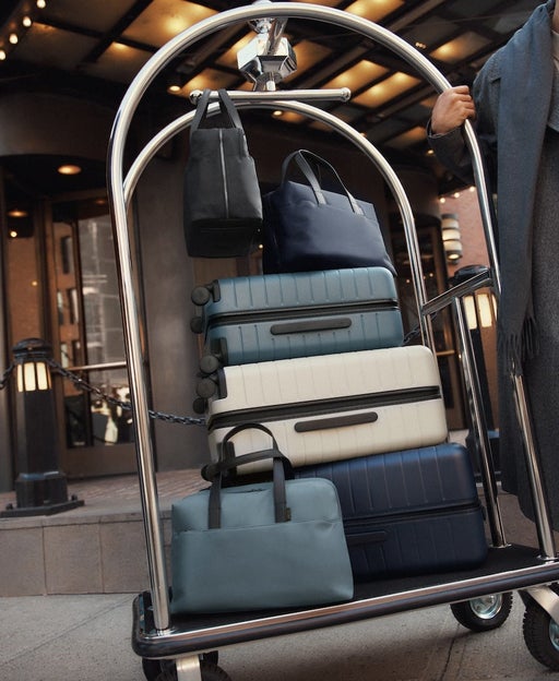 suitcases on luggage cart