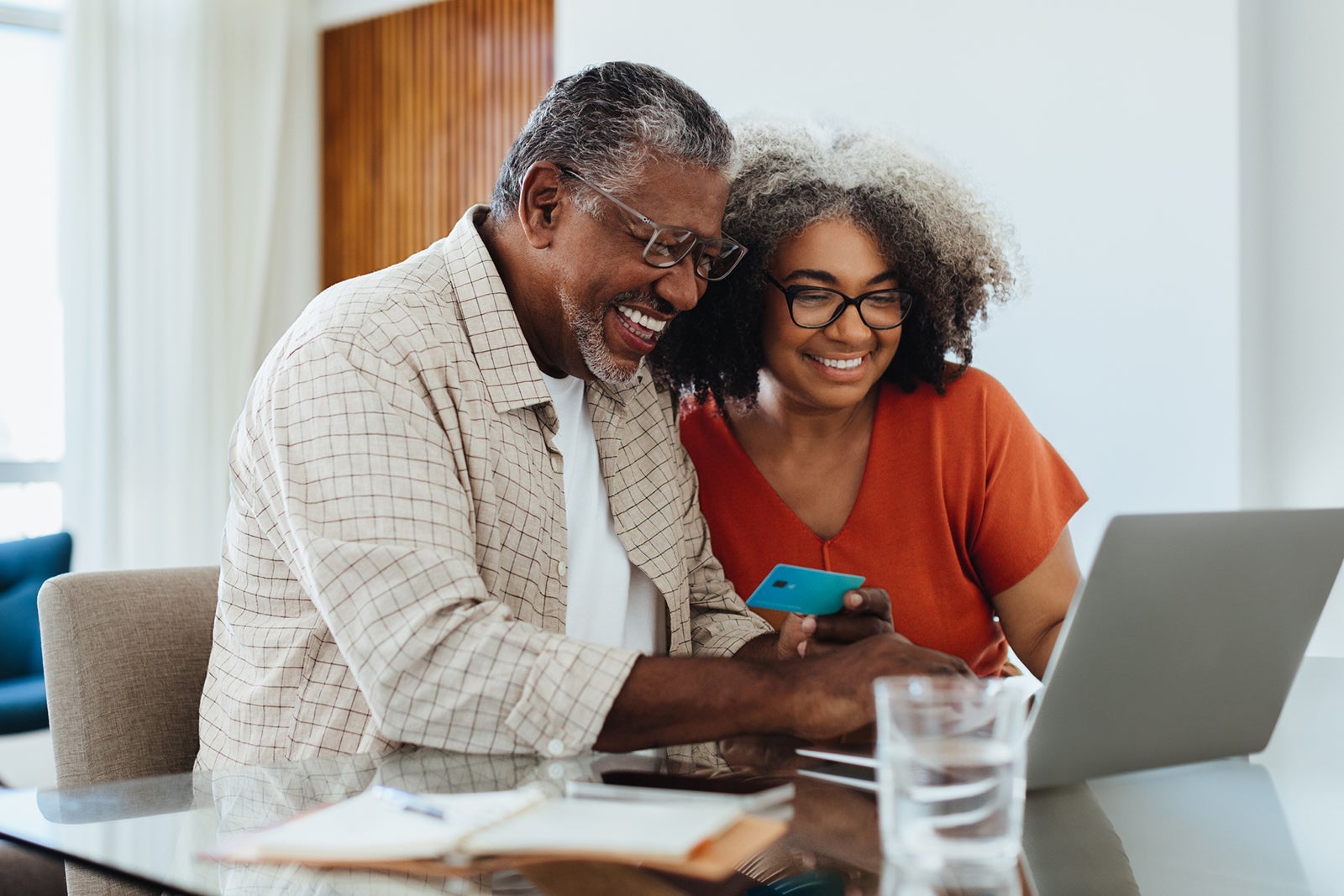 couple holding credit card