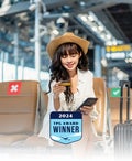 Woman using a credit card at the airport