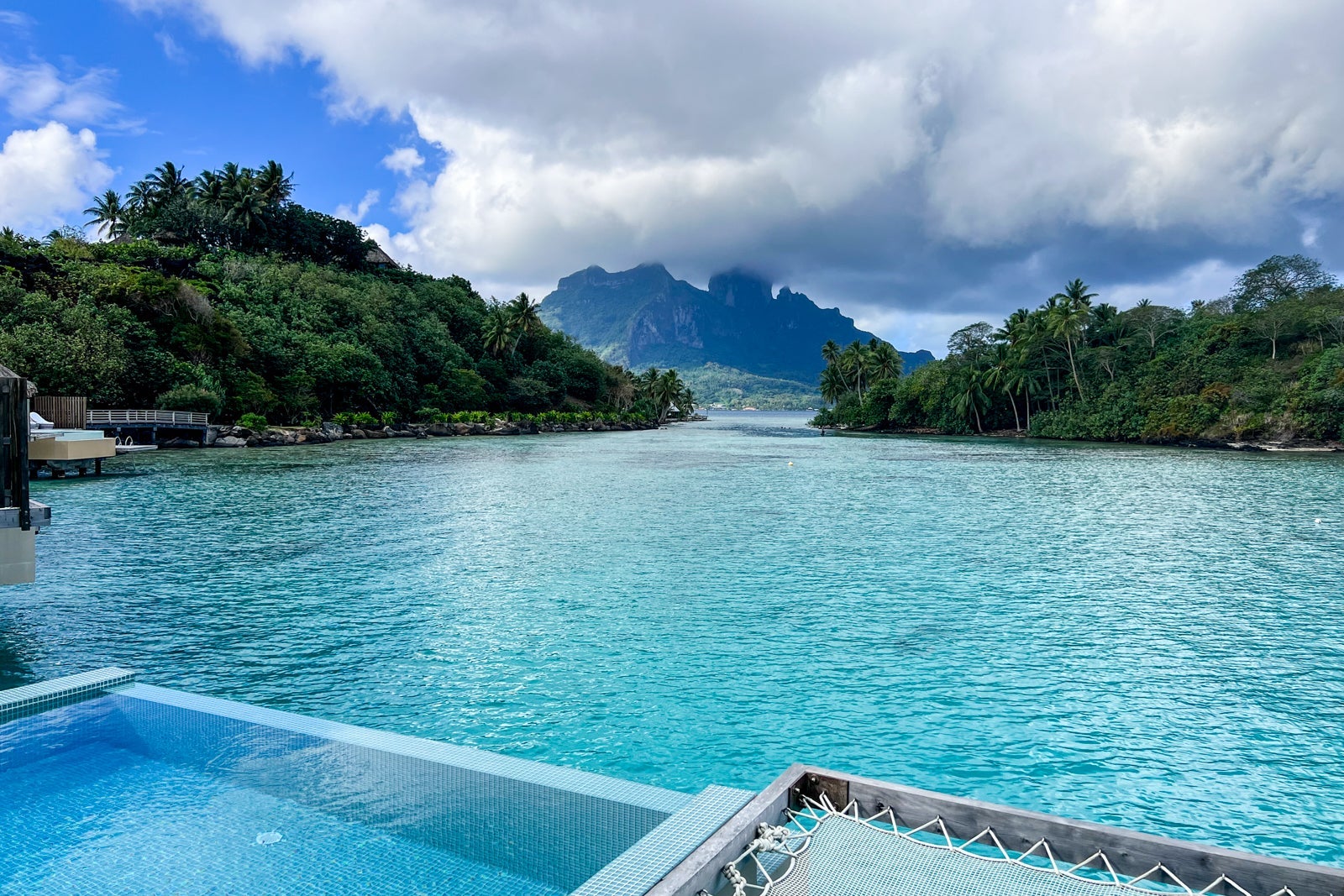 How I got a $35 per night Hilton stay in Portugal with Amex Conrad Bora Bora pool overlooking ocean