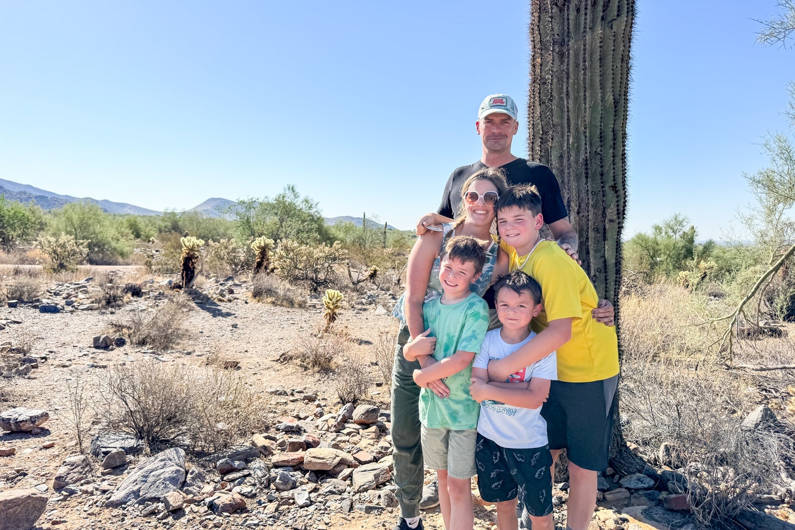 Family posing in desert