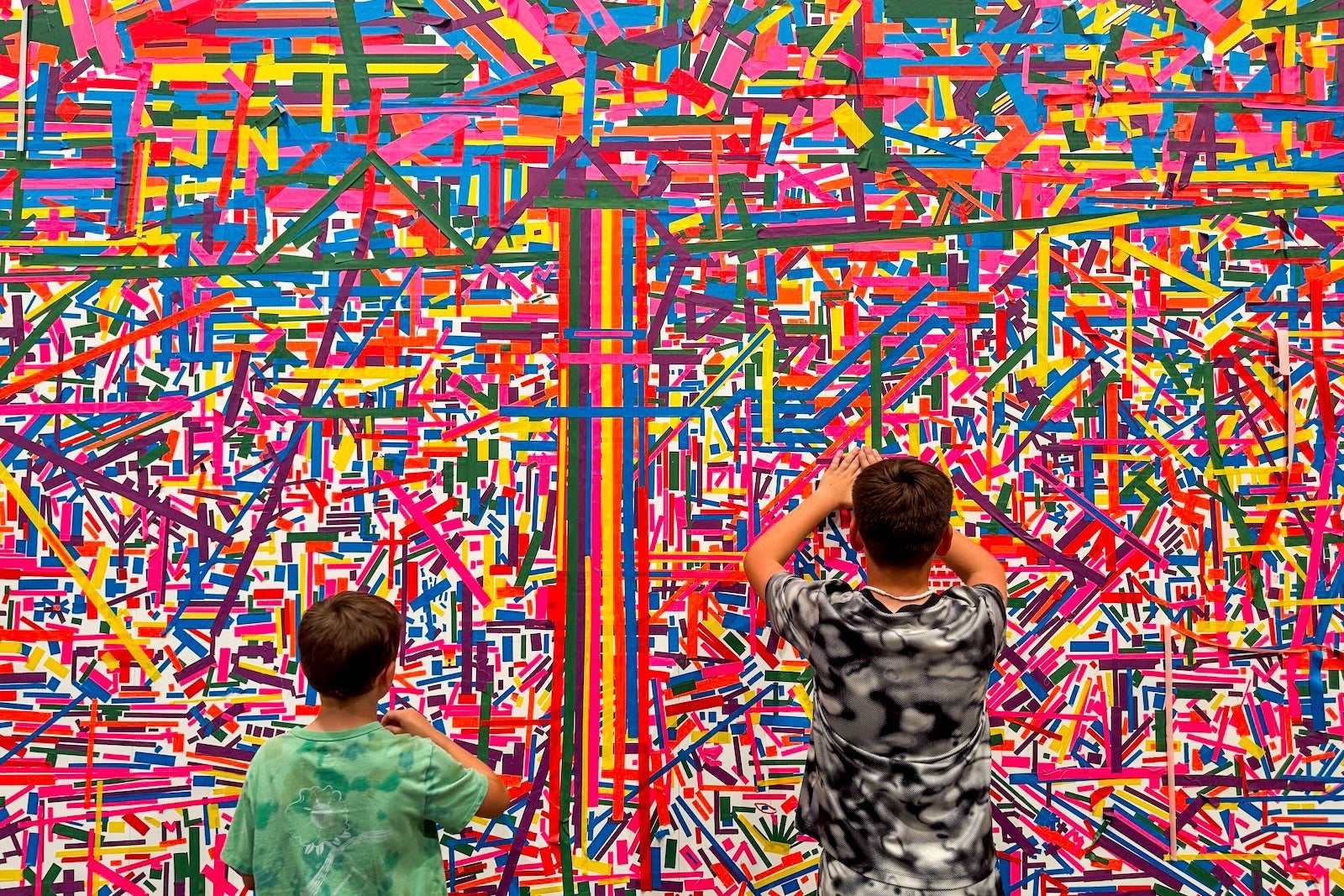 Boys looking at museum exhibit