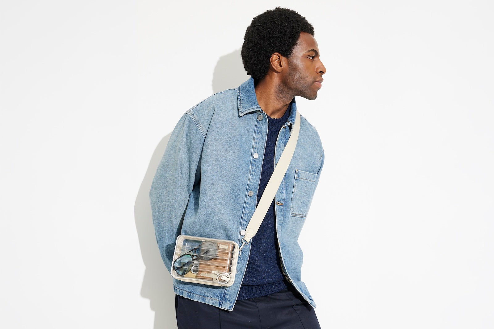 person wering crossbody bag