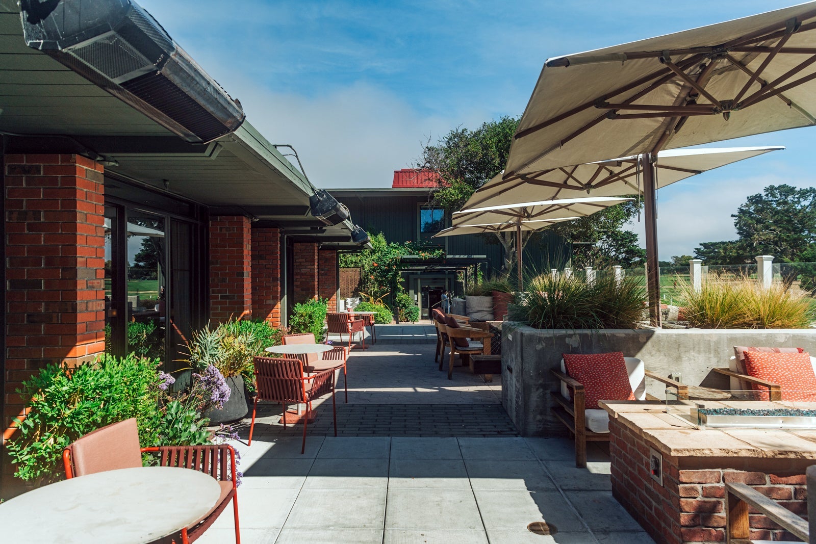 Hyatt Regency Monterey Hotel & Spa outdoor seating area overlooking golf course