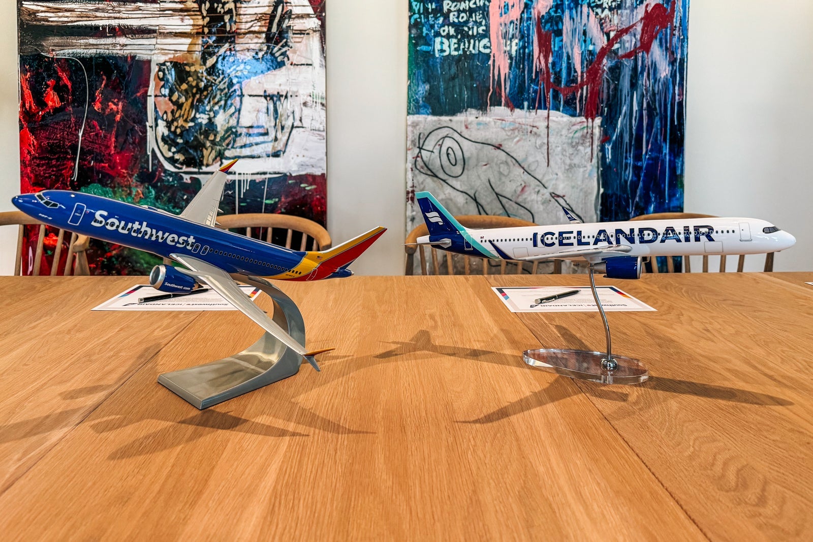 two model airplanes on a table