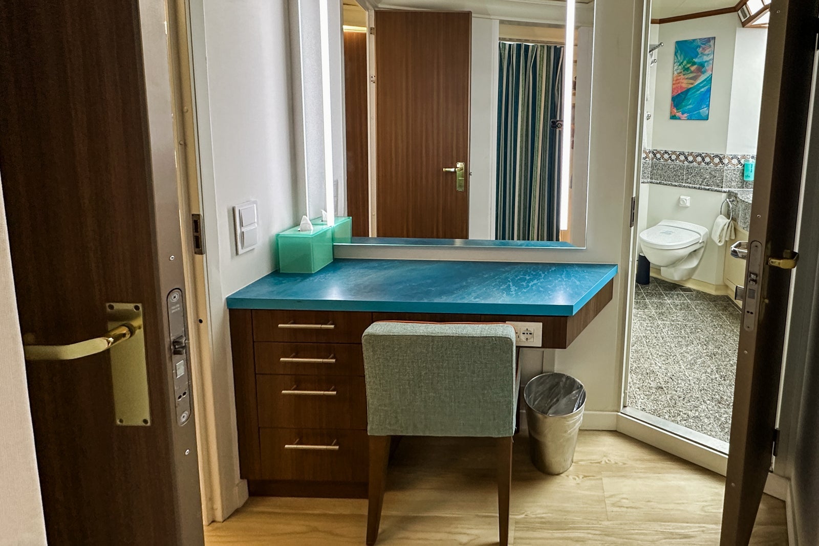 The desk/vanity area in a cruise ship cabin