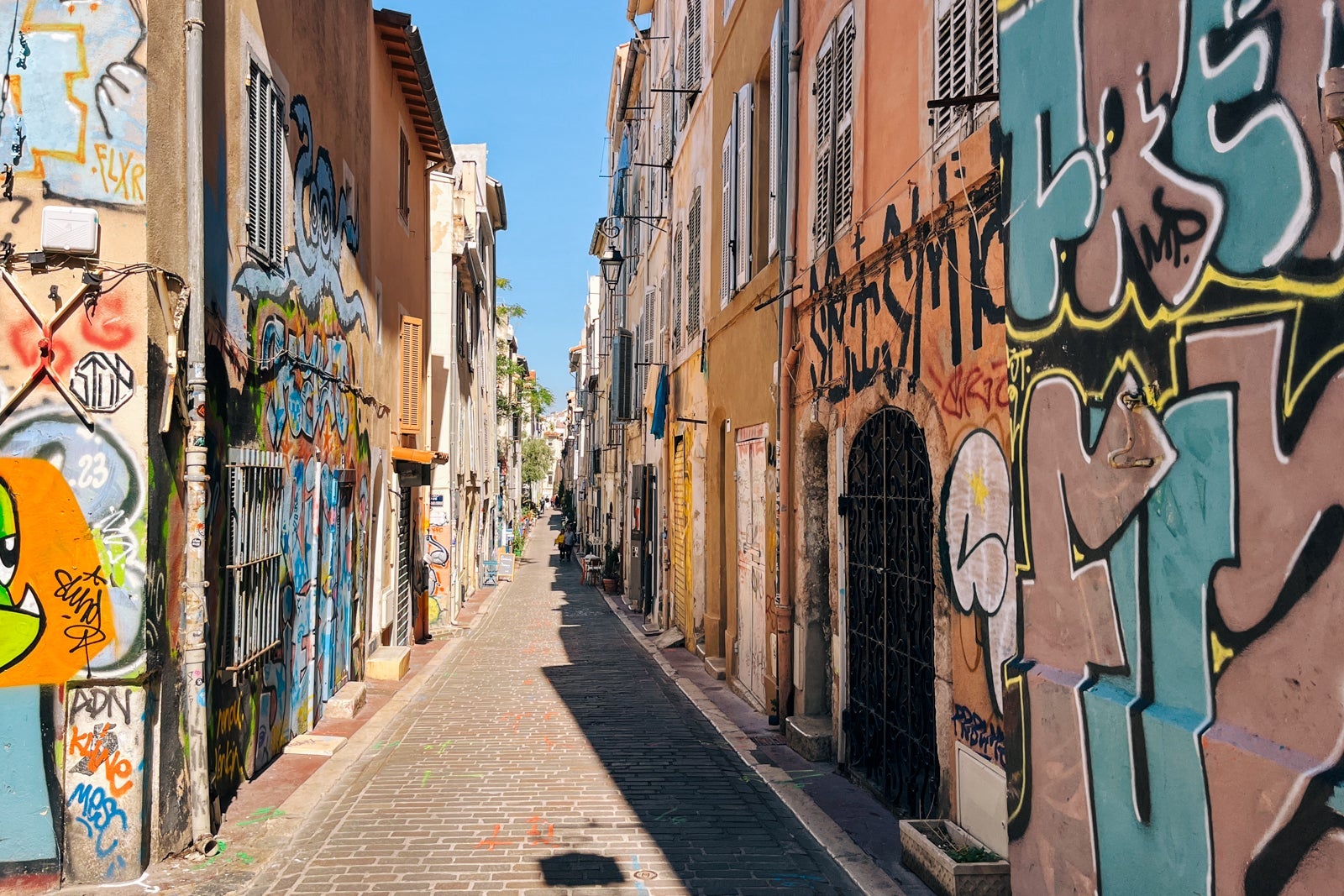Graffiti-lined street in Marseille, France.