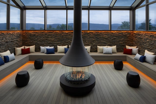 sitting area with fire pit in the middle