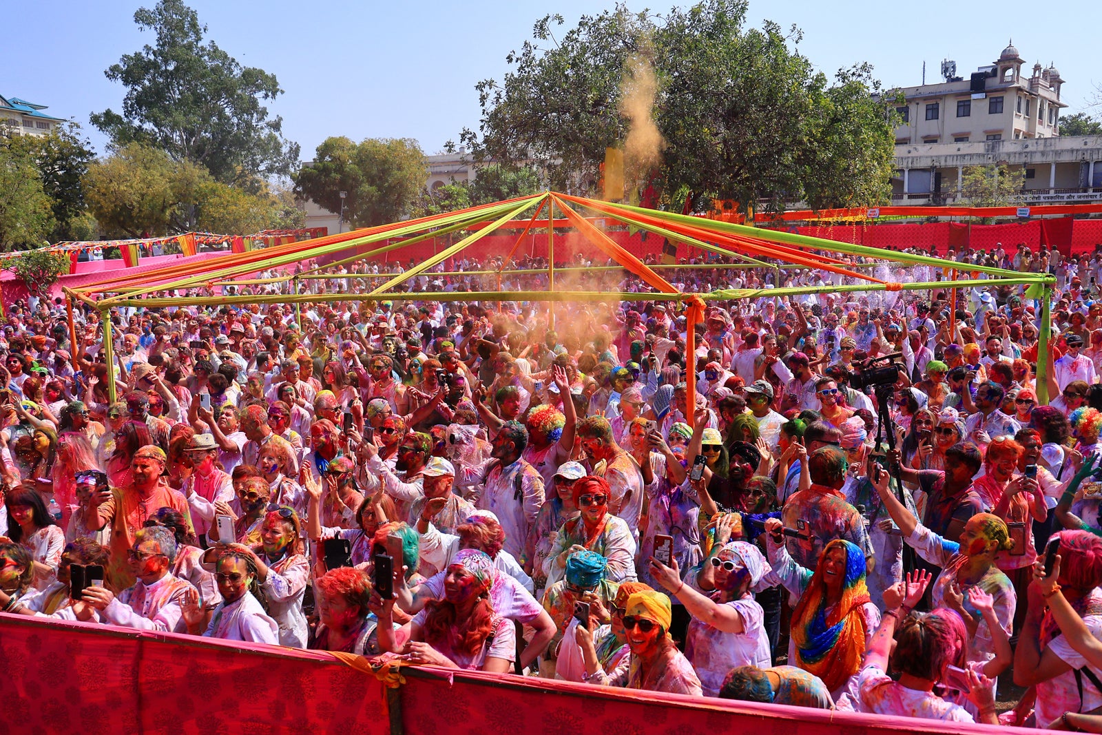 Tourists play with colors during the 'Dulandi' (Holi) festival celebration organized by Rajasthan Tourism at Khasa Kothi in Jaipur, Rajasthan, India, on March 14, 2025. Tourists play with colors during the 'Dulandi' (Holi) festival celebration organized by Rajasthan Tourism at Khasa Kothi in Jaipur, Rajasthan, India, on March 14, 2025.