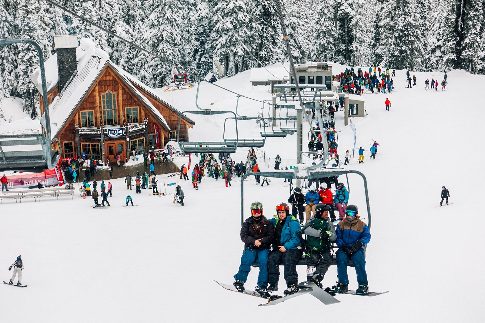 Snowboarders Ride Ski Lift at Mt Baker Ski Area