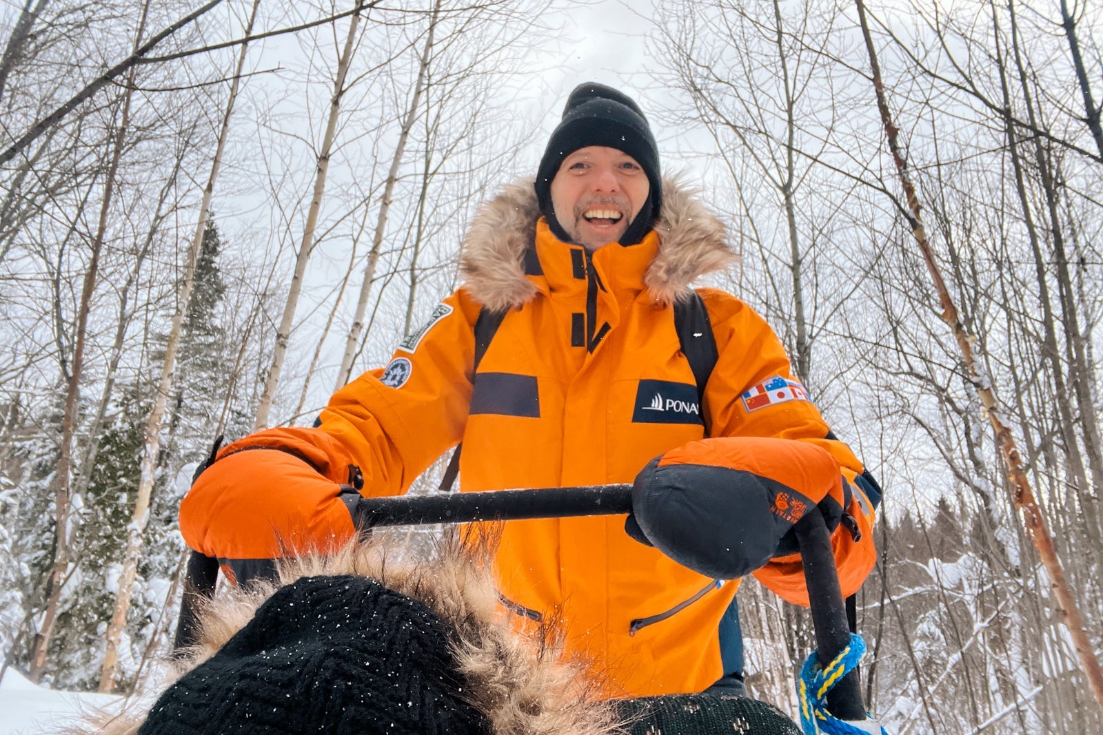 TPG's Gene Sloan mushing a dog sled team during an outing from Le Commandant Charcot