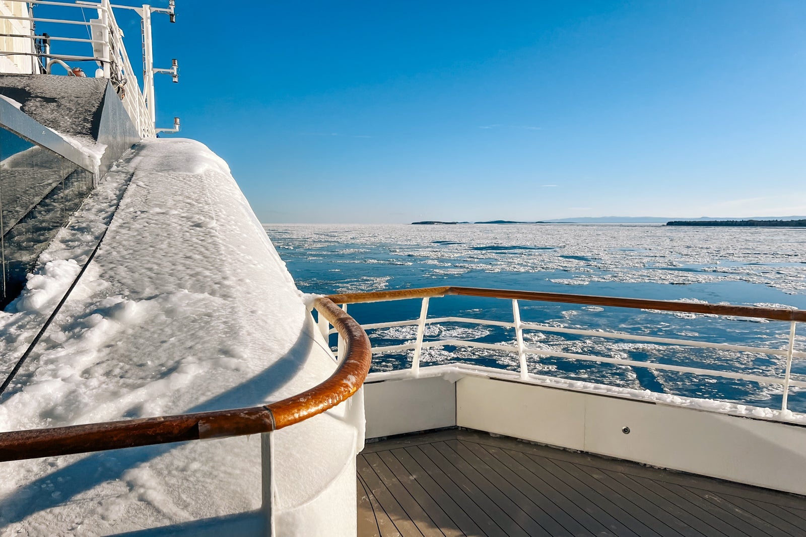 The Ponant icebreaker Le Commandant Charcot sailing on the Saint Lawrence River in winter