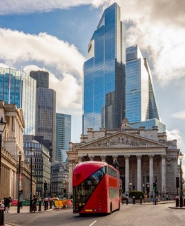Royal Exchange building and skyscrapers in City of London, UK