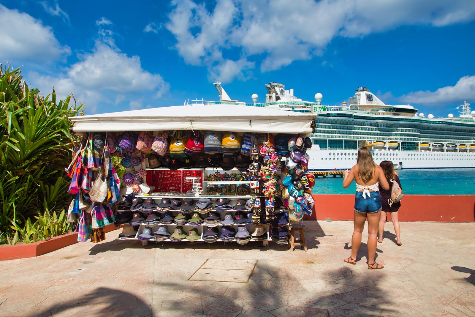 Souvenir stand in Cozumel, Mexico, with cruise ship in the background