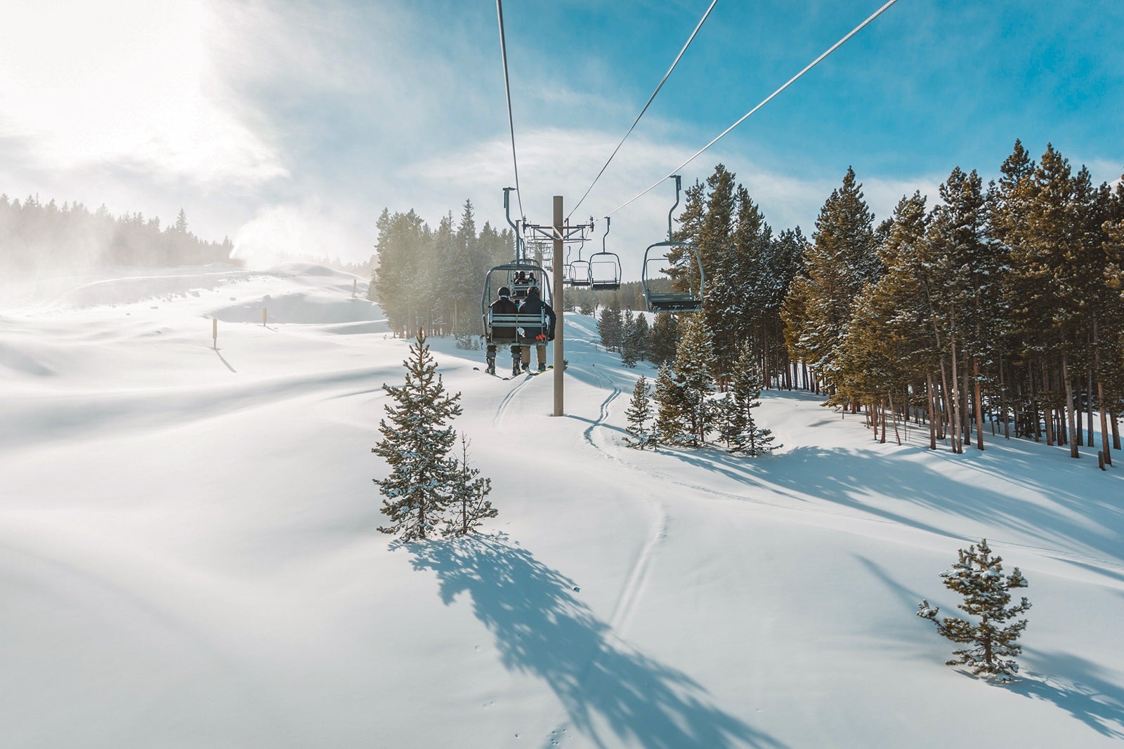 View of untracked ski slope and ski lift in Breckenridge ski resort.