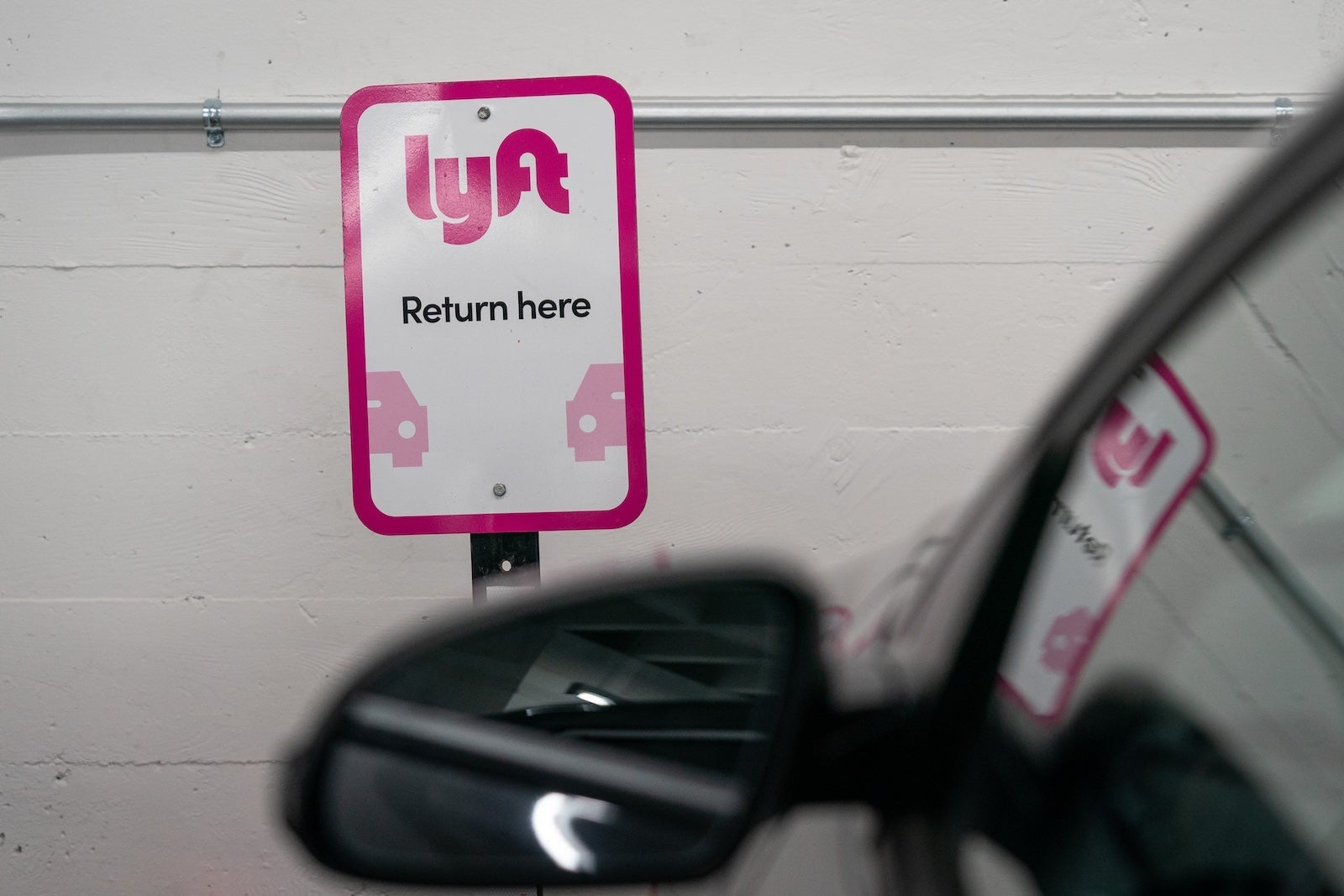 Lyft signage at a vehicle rental location in San Francisco, California, US, on Thursday, Feb. 8, 2024. Lyft Inc. is scheduled to release earnings figures on February 13. Photographer: Loren Elliott/Bloomberg