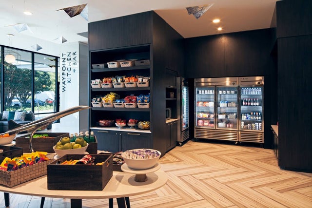 Hotel lobby with breakfast items displayed