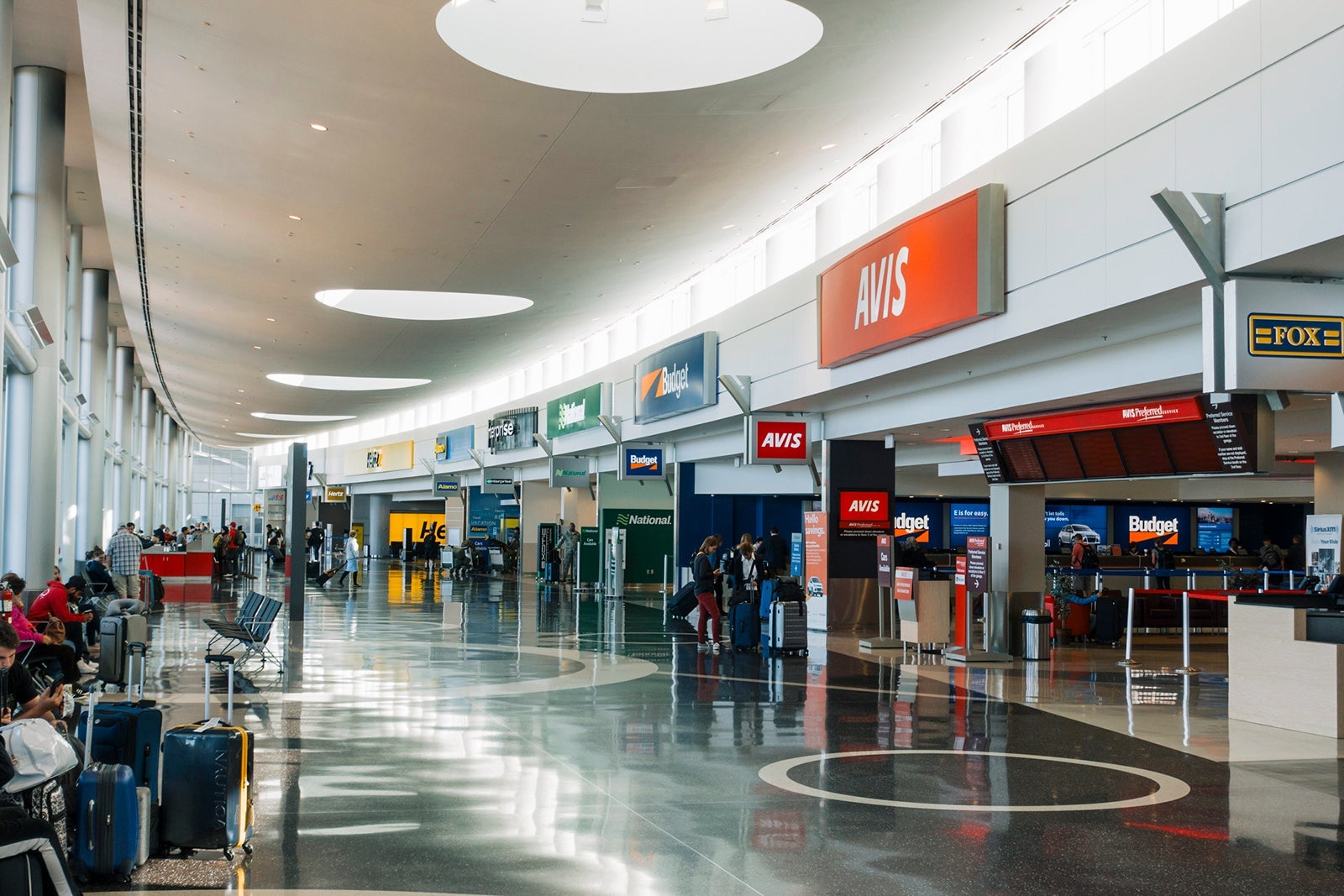 Travelers at the car rental center of Seattle-Tacoma International Airport.