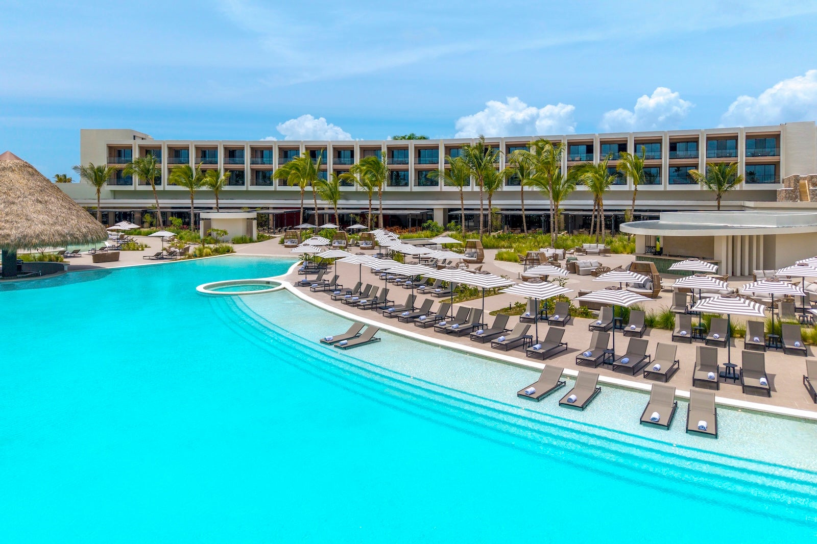 pool with hotel in the background