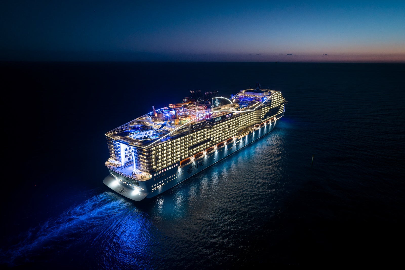 MSC World America at sea in the evening
