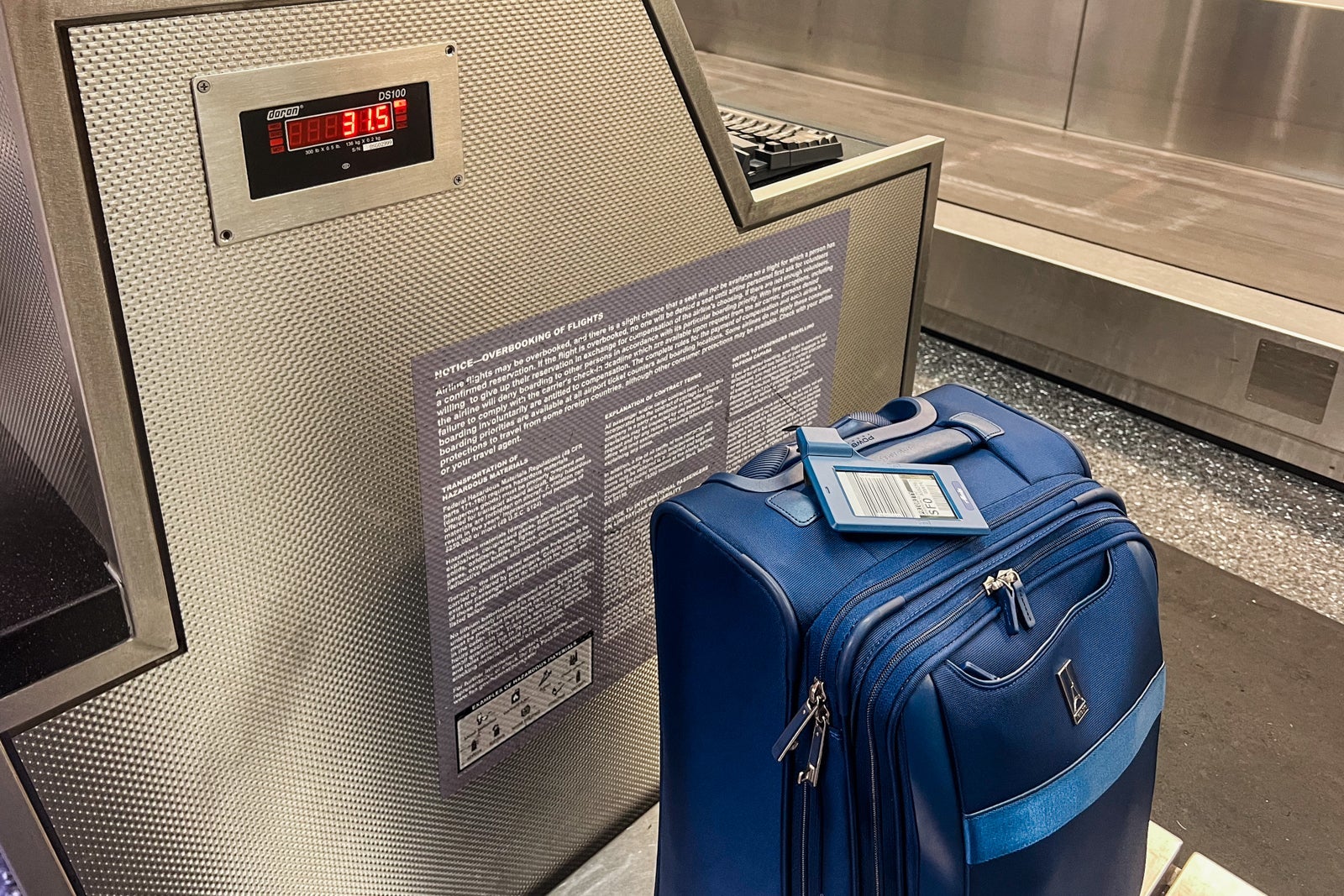 suitcase with digital bag tag