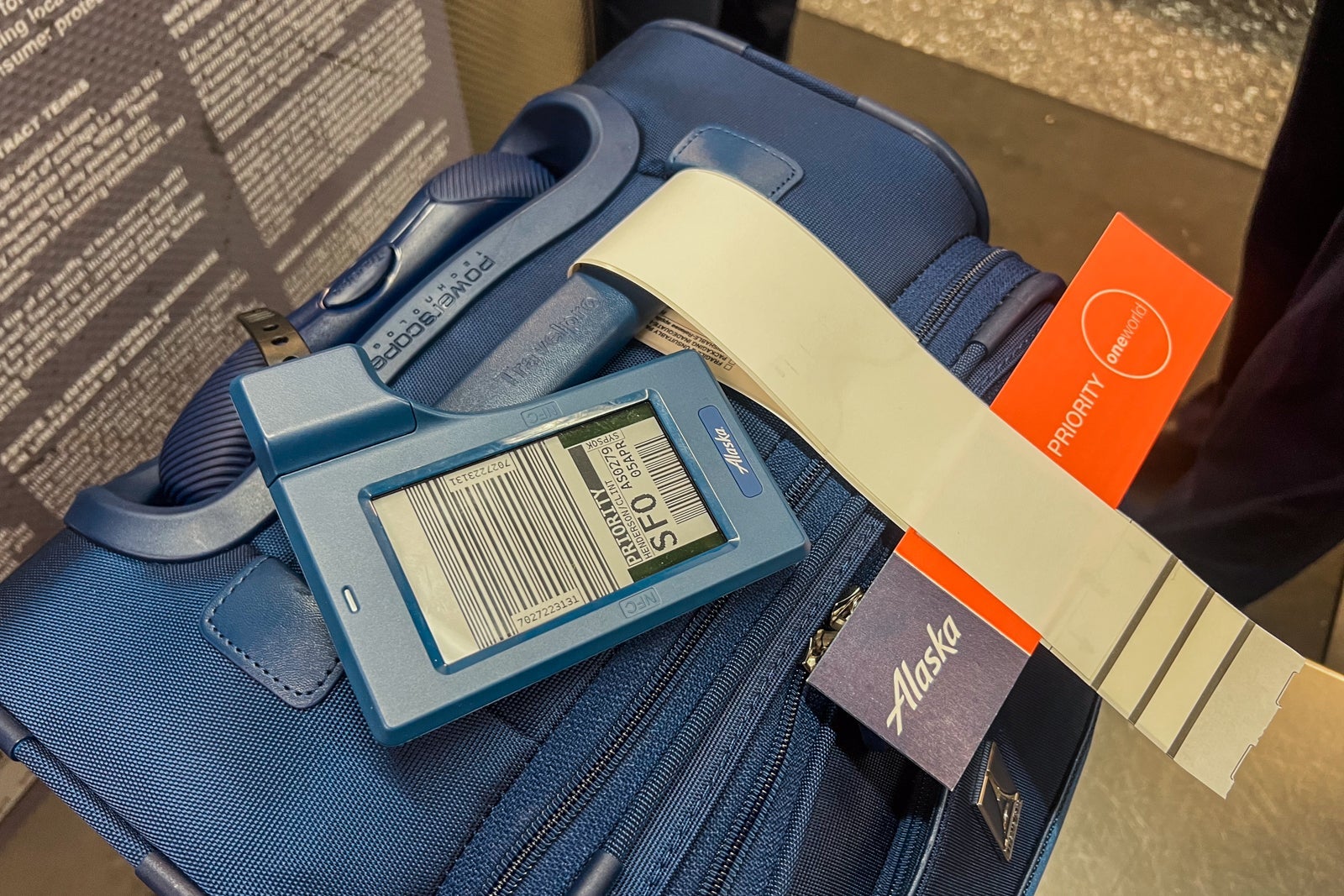 suitcase with digital bag tag