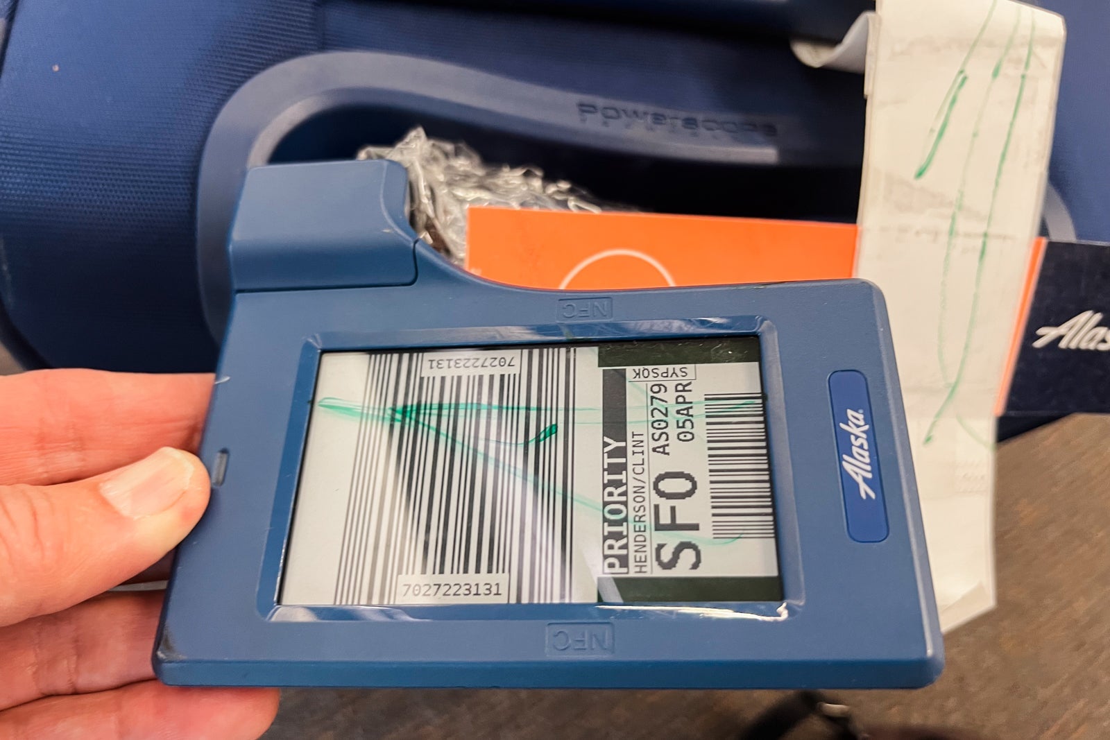 suitcase with digital bag tag