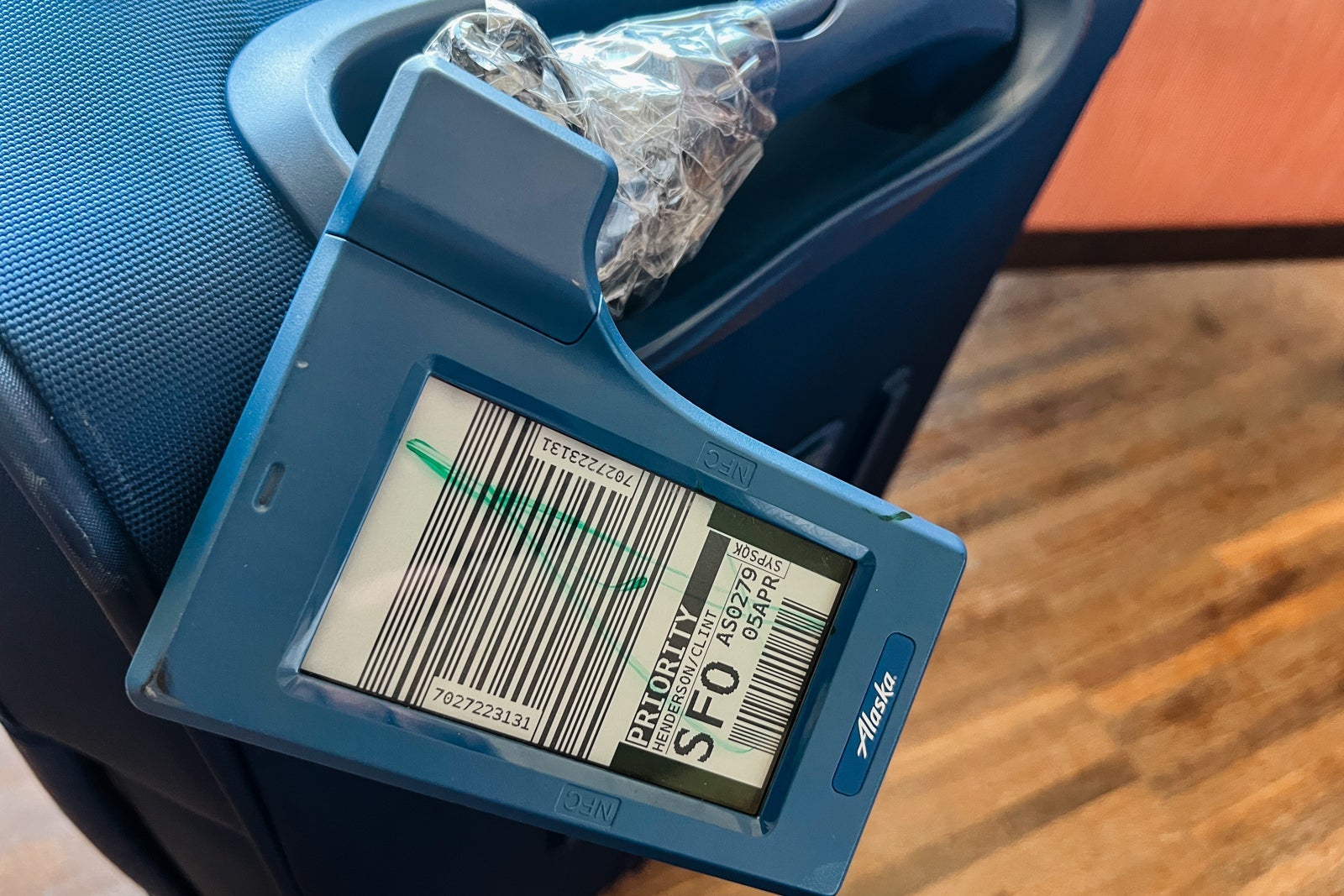 suitcase with digital bag tag