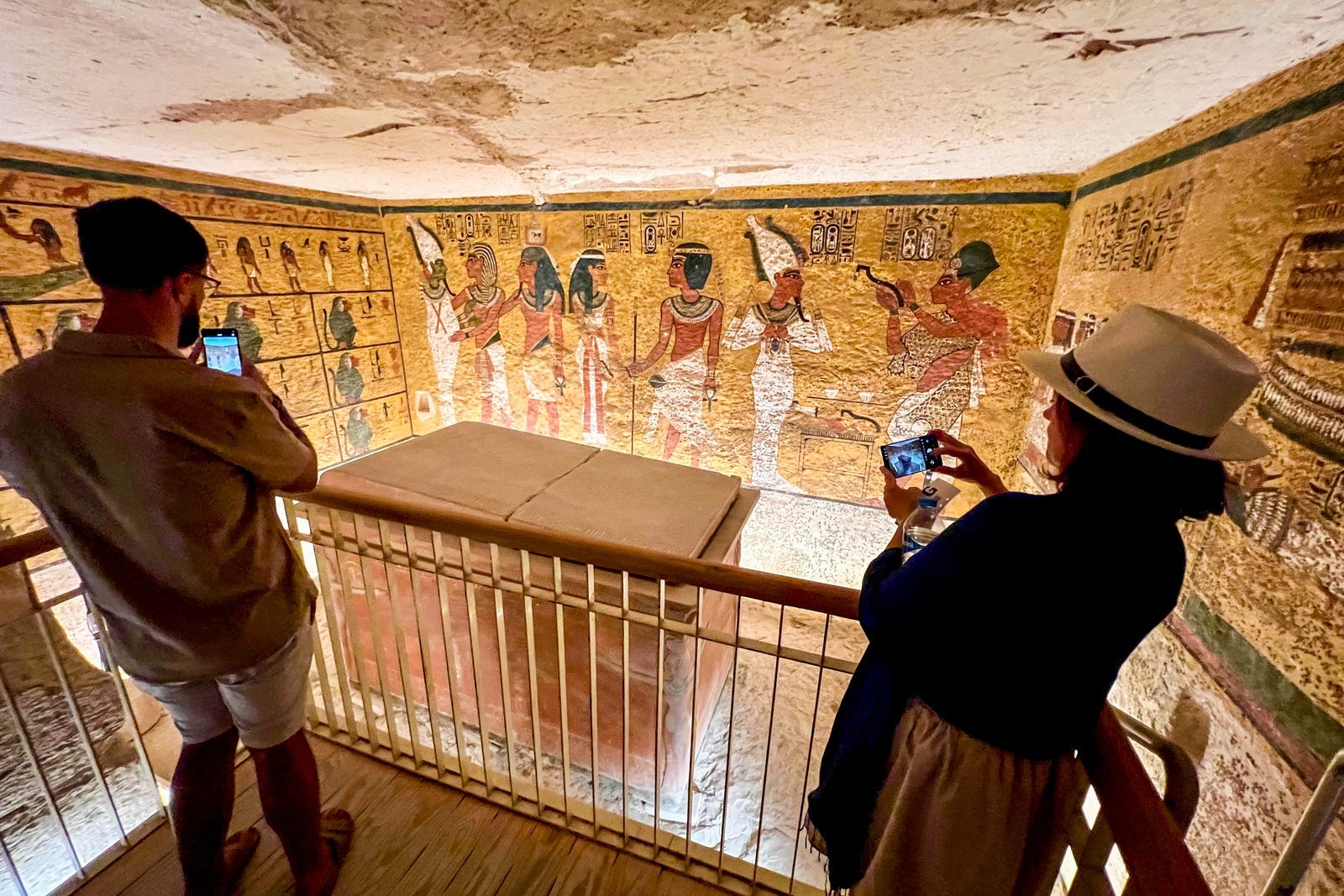 AmaWaterways passengers snap photos of the sarcophagus of the pharaoh Tutenkhamun after descending into his tomb.