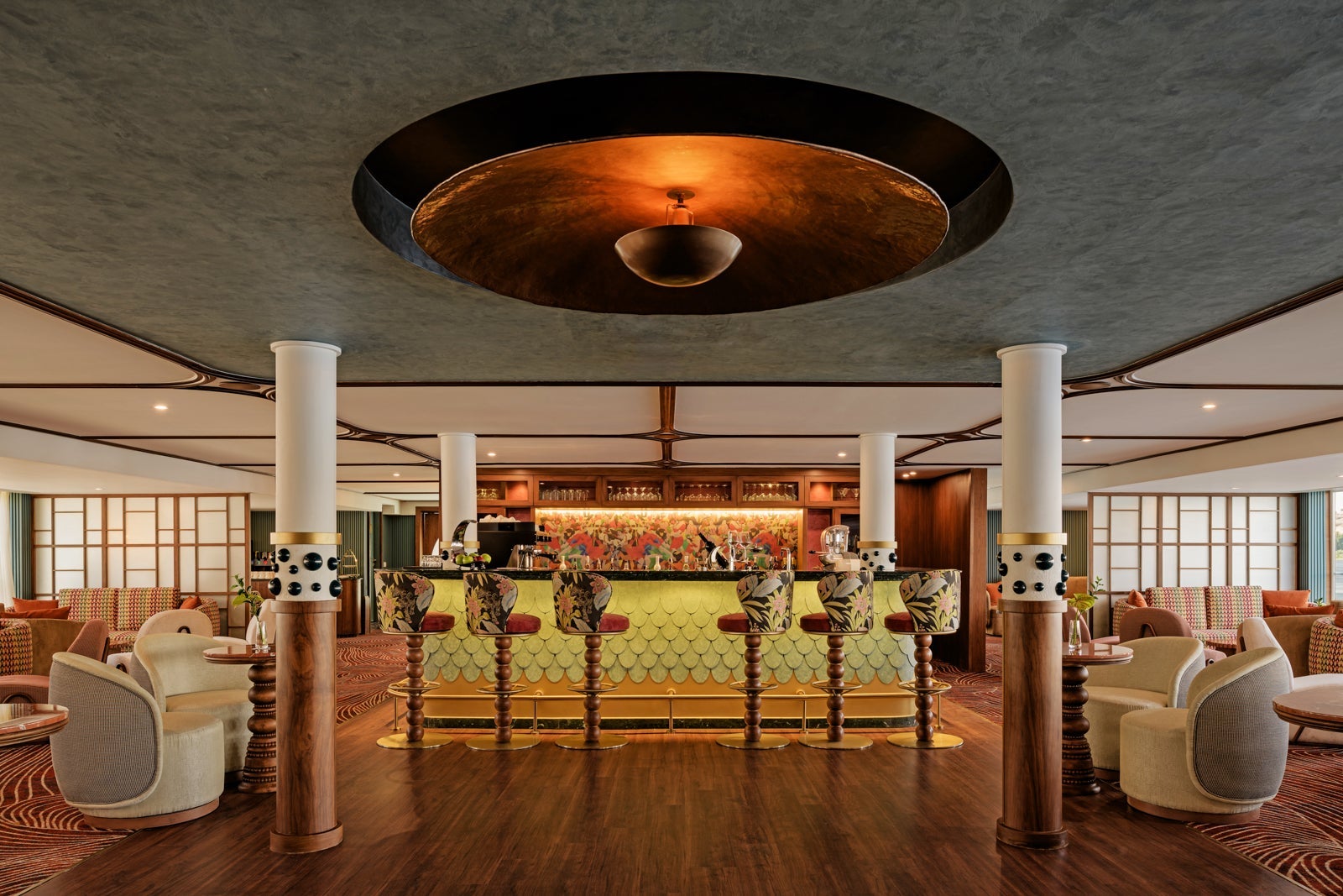 AmaLilia has a cozy lounge with a bar that looks out over the river.