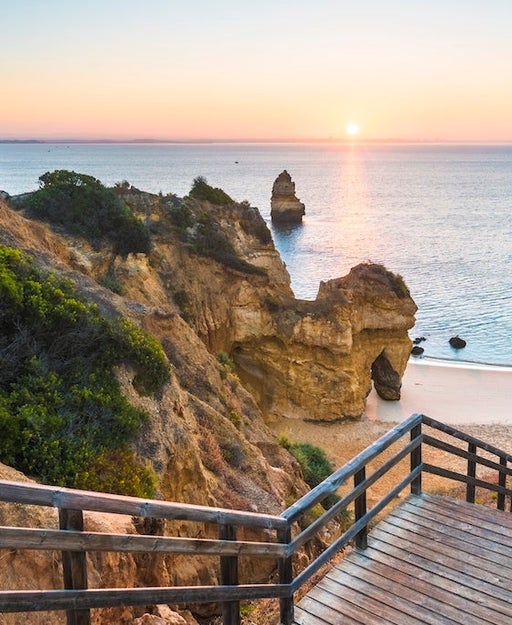 Walkway to idyllic beach, Algarve, Portugal