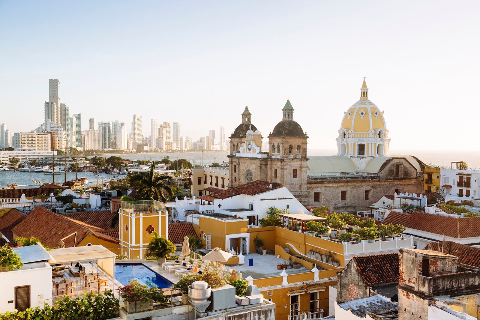 Skyline of Cartagena with the Church of San Pedro Claver and Monastery and the modern building of Bocagrande in the background. Cartagena de Indias, Colombia.