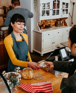 Paying a barista for coffee