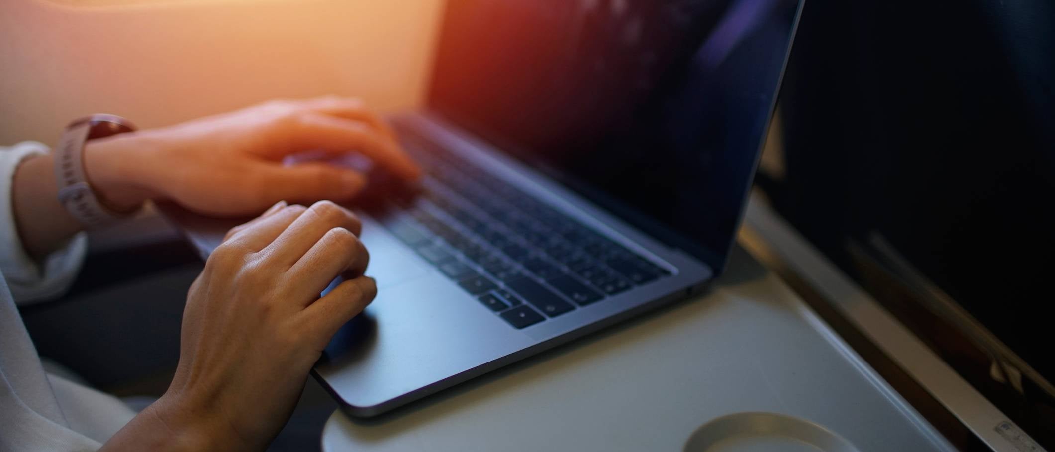 person using laptop