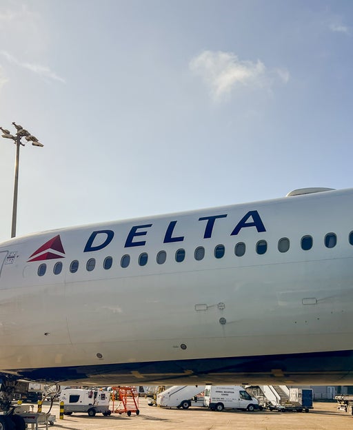 Delta jet on an airport tarmac.