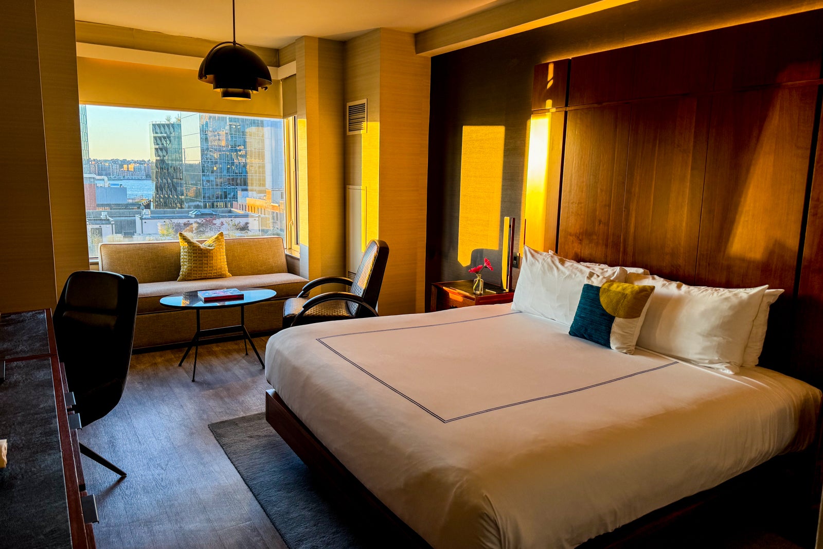 hotel room with city skyline in background