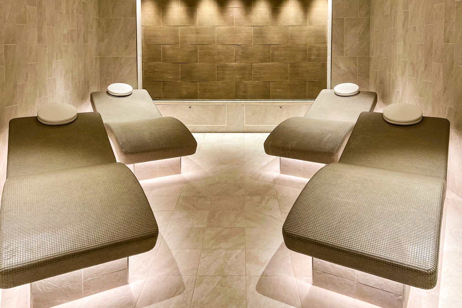 Heated lounge chairs in the spa on a Viking ship.