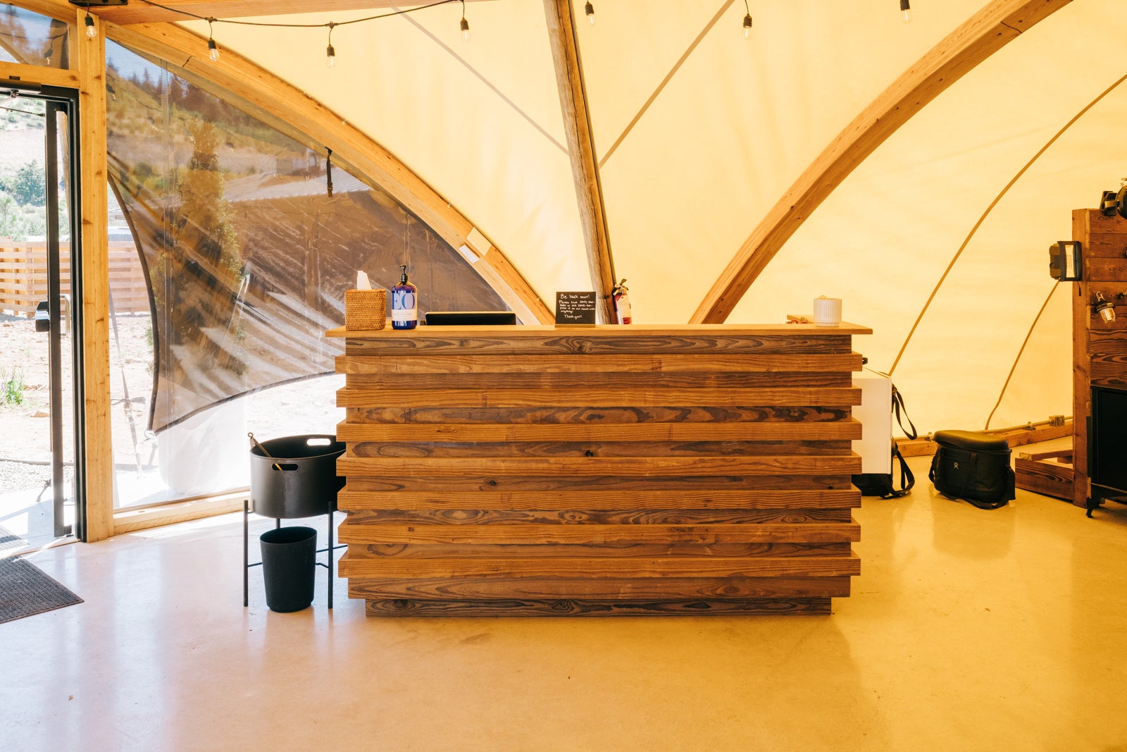 Under Canvas Columbia Gorge Main tent with check in, dining, and lounge