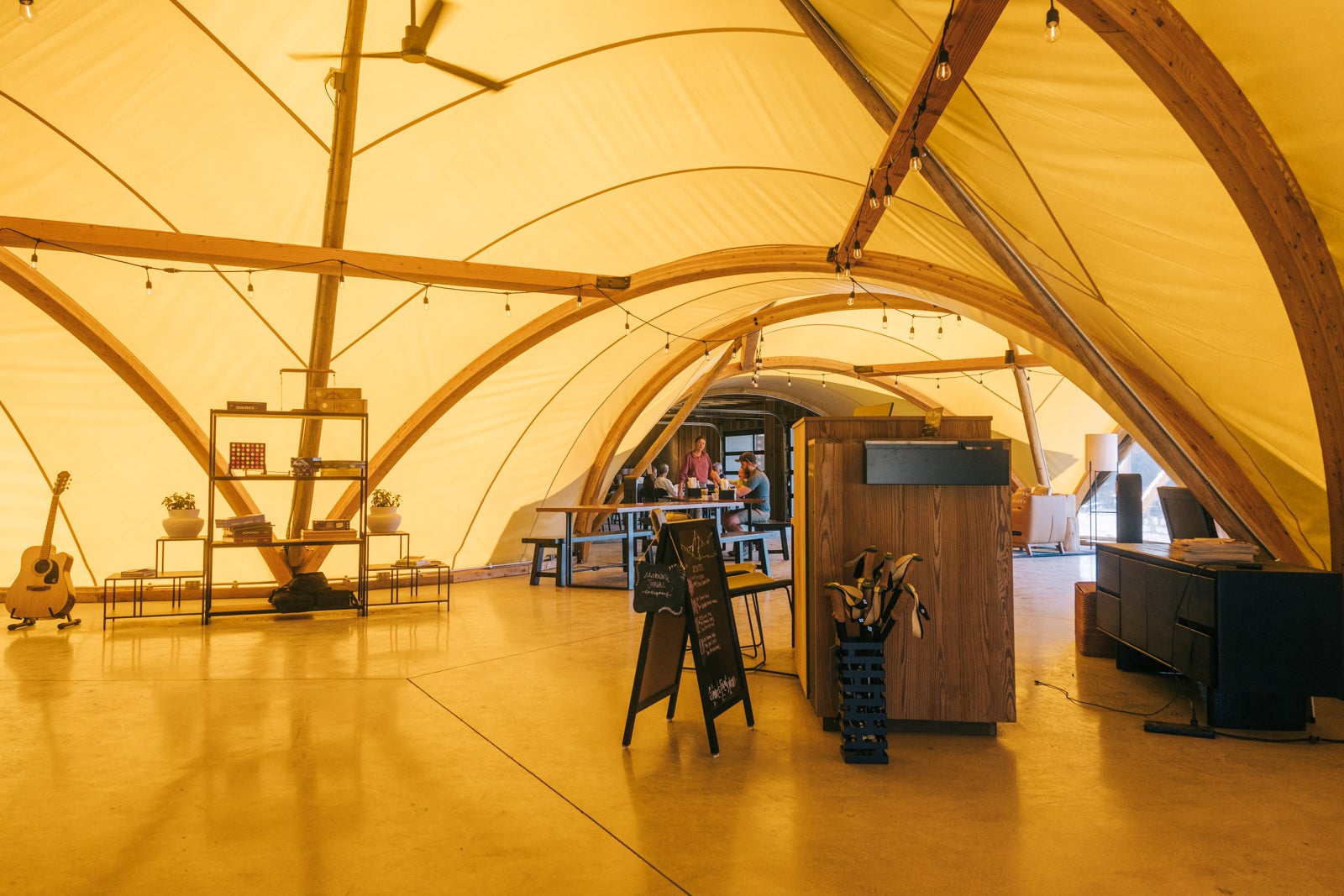 Under Canvas Columbia Gorge Reception Tent with games and activities posted